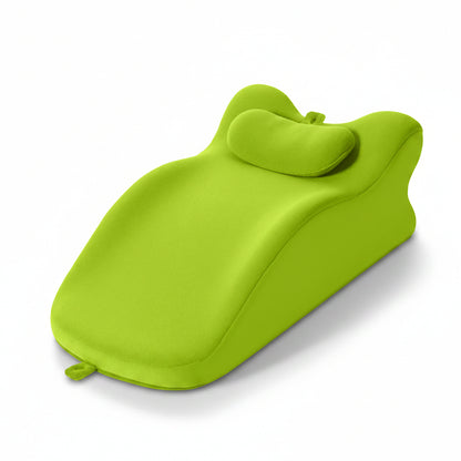 Green bath pillow on a white background